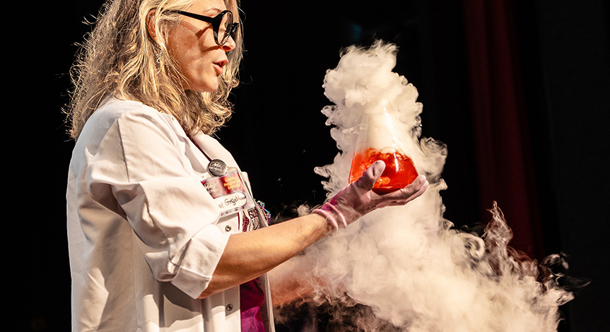 Mad scientist holding a beaker with a red liquid inside and smoke pouring out of it