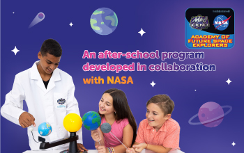 An Instructor teaching kids about the solar system using a model from our NASA Academy of Future Space Explorers after-school